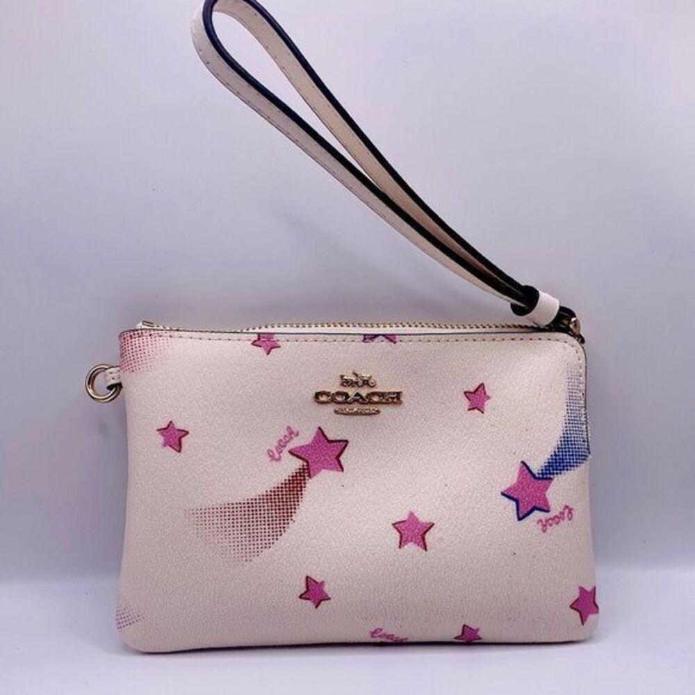 NWT COACH Corner Zipped Wristlet 
Designer, Trendy Must Have 
Disco Star Print